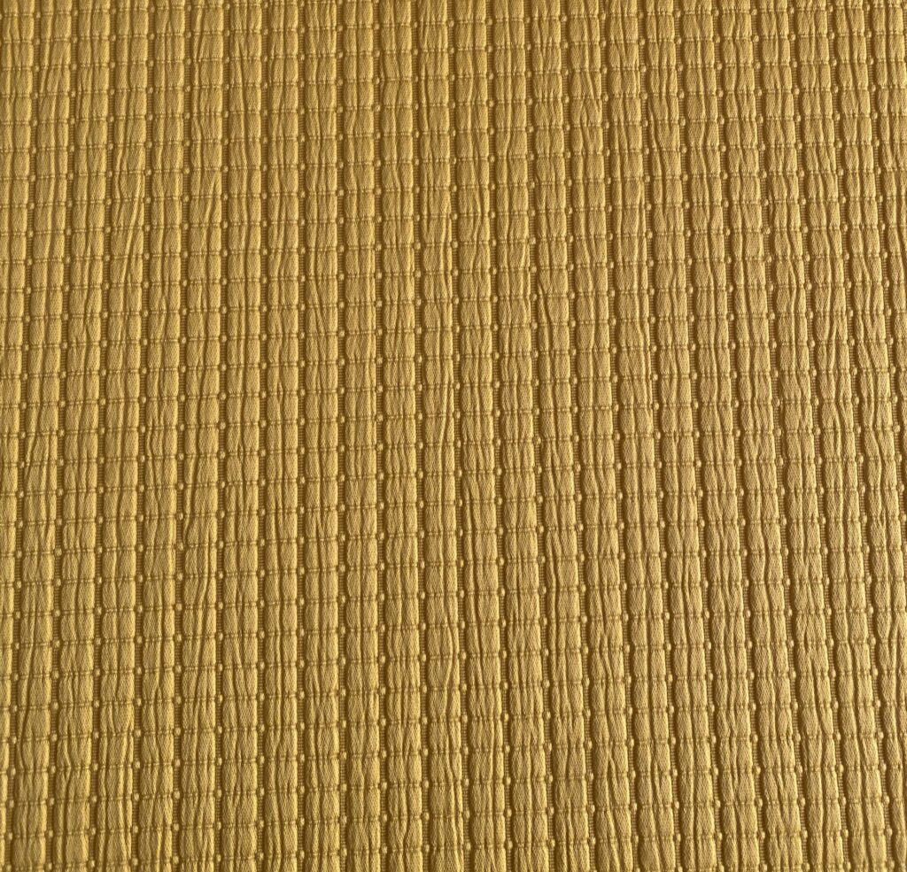 Tessuto materico giallo 3,4 m.